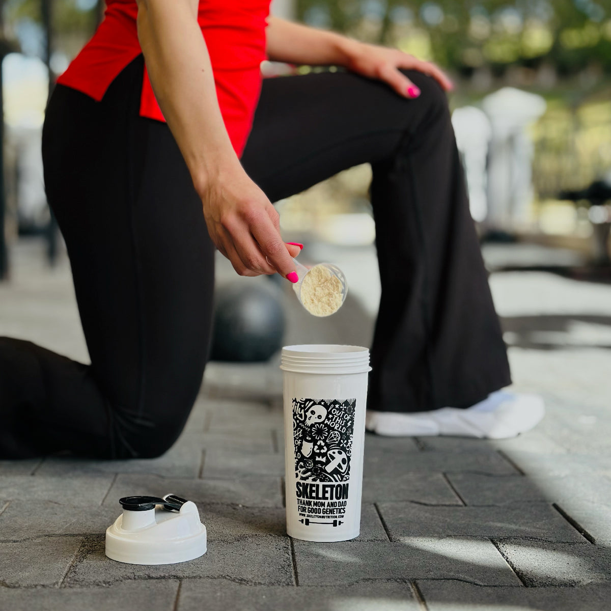 Skeleton Whey Protein Standard shake in gym setting – post workout protein for muscle recovery